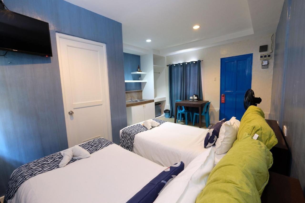 Pescadores Suites Moalboal Bagian luar foto