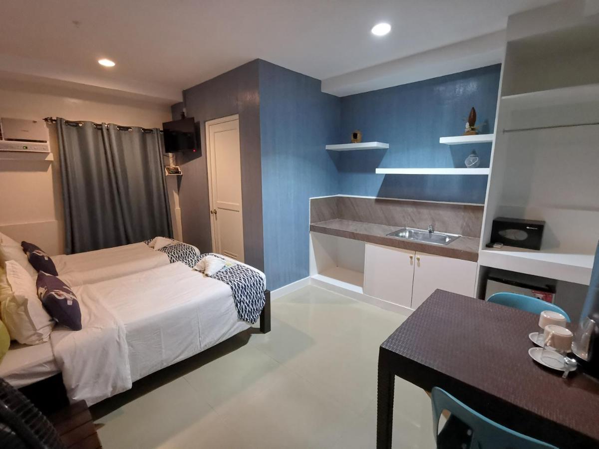 Pescadores Suites Moalboal Bagian luar foto