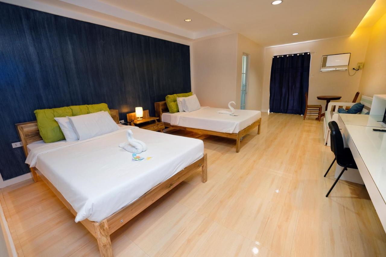 Pescadores Suites Moalboal Bagian luar foto